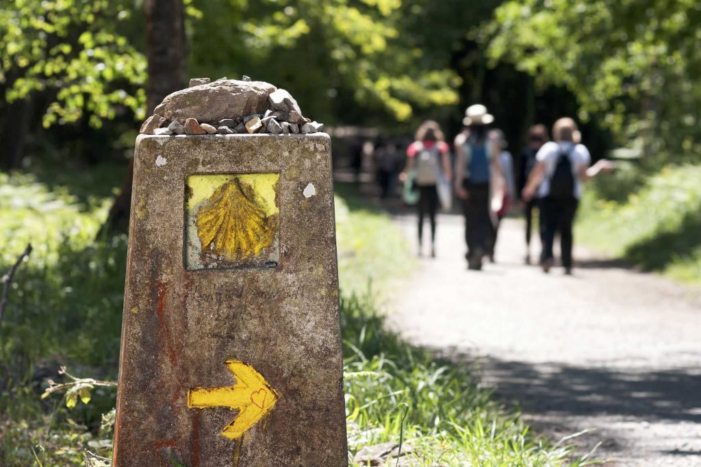 group of pilgrims walking the Camino de Santiago Joe Walsh Tours Pilgrimages travel