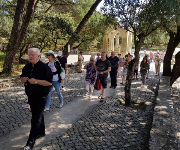 priest and group Hungarian Stations of the Cross in Fatima Joe Walsh Tours Pilgrimages